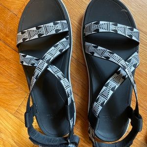 Black and white Teva sandals size 8